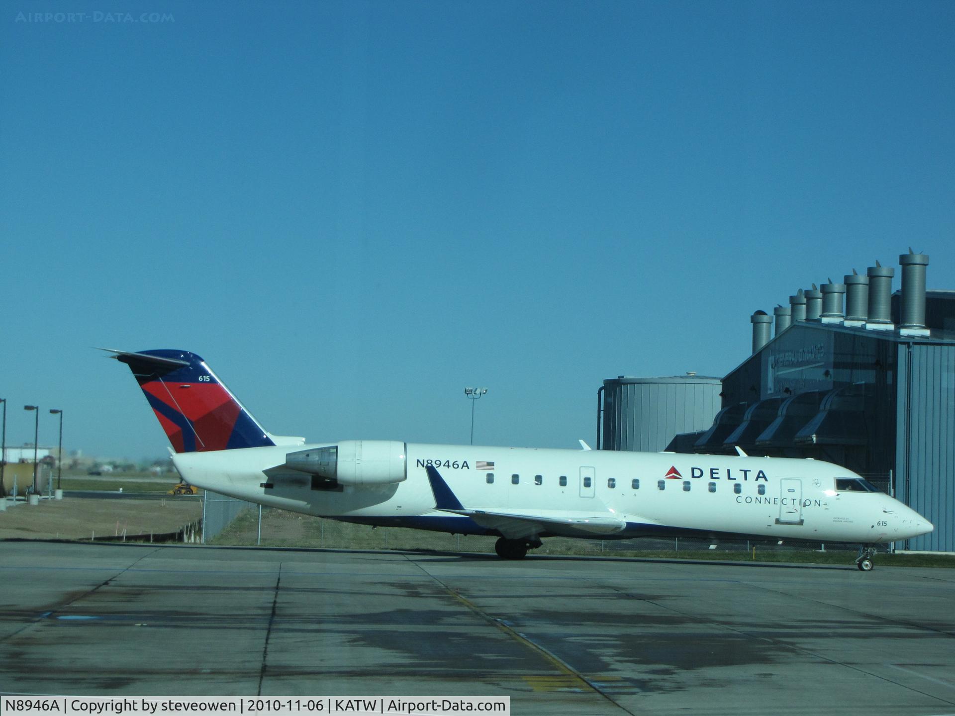 N8946A, 2004 Bombardier CRJ-200 (CL-600-2B19) C/N 7946, Taken from inside the terminal