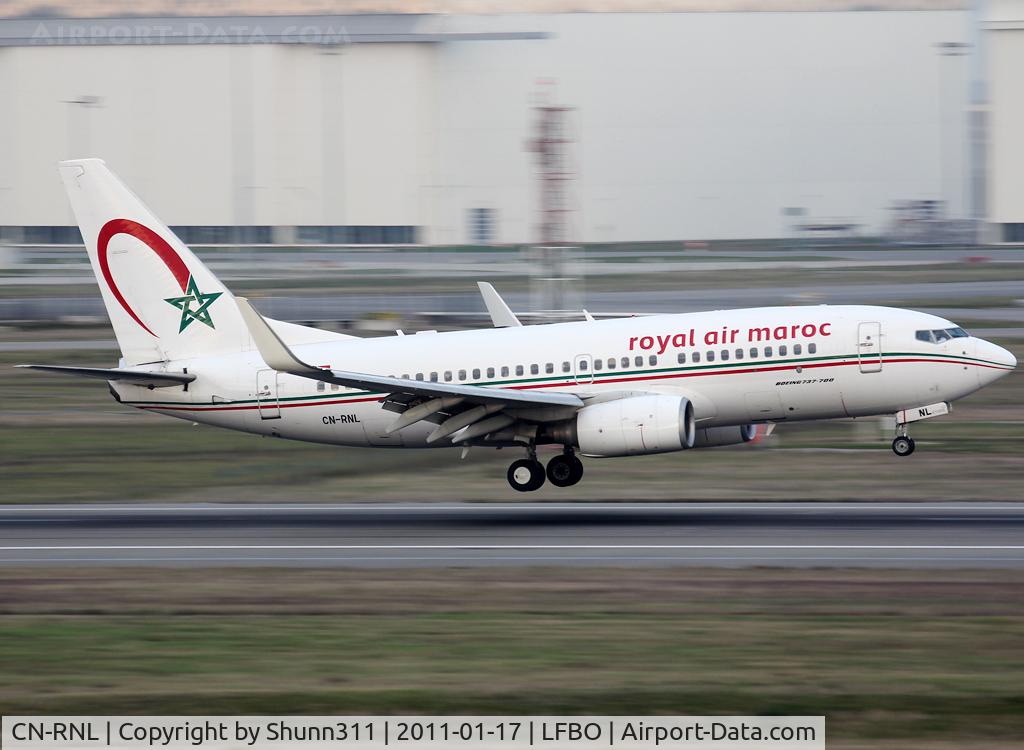 CN-RNL, 1999 Boeing 737-7B6 C/N 28982, Landing rwy 14R with French titles...