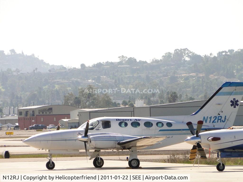 N12RJ, 1977 Cessna 421C Golden Eagle C/N 421C0306, Parked south of Jet Air hnager area