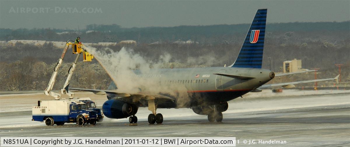 N851UA, 2002 Airbus A319-131 C/N 1664, Being de-iced at BWI