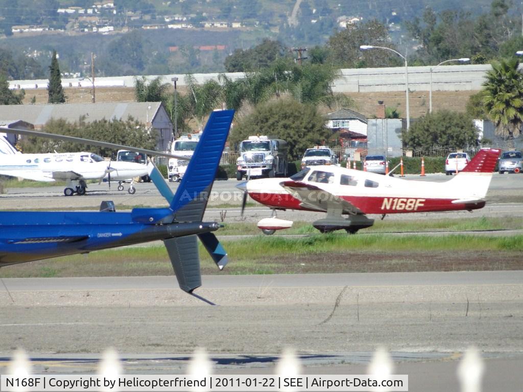 N168F, 1999 Piper PA-28-181 C/N 2843264, Just landed on runway 27L and rolling out