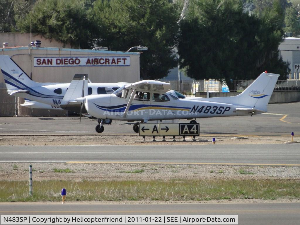 N483SP, 1998 Cessna 172S C/N 172S8029, After landing, instructor and student are returning to their parking area via taxiway A