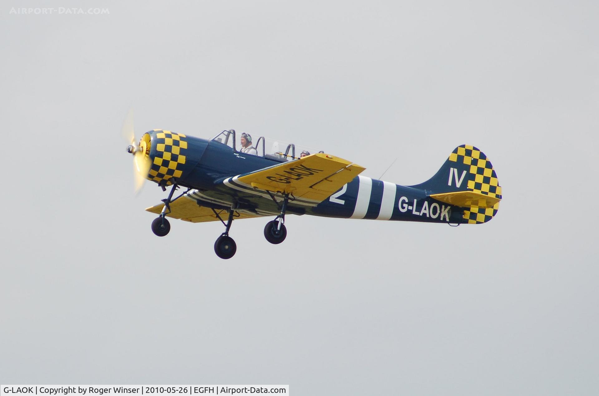 G-LAOK, 1987 Bacau Yak-52 C/N 877404, Departing Runway 22. De-registered on 23 June 2010 to become G-OUGH.