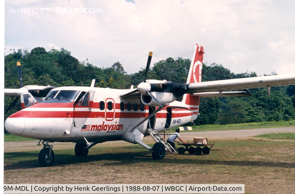 9M-MDL, 1983 De Havilland Canada DHC-6-300 Twin Otter C/N 802, Malaysian , Twin Otter at Belaga landing strip , 1988