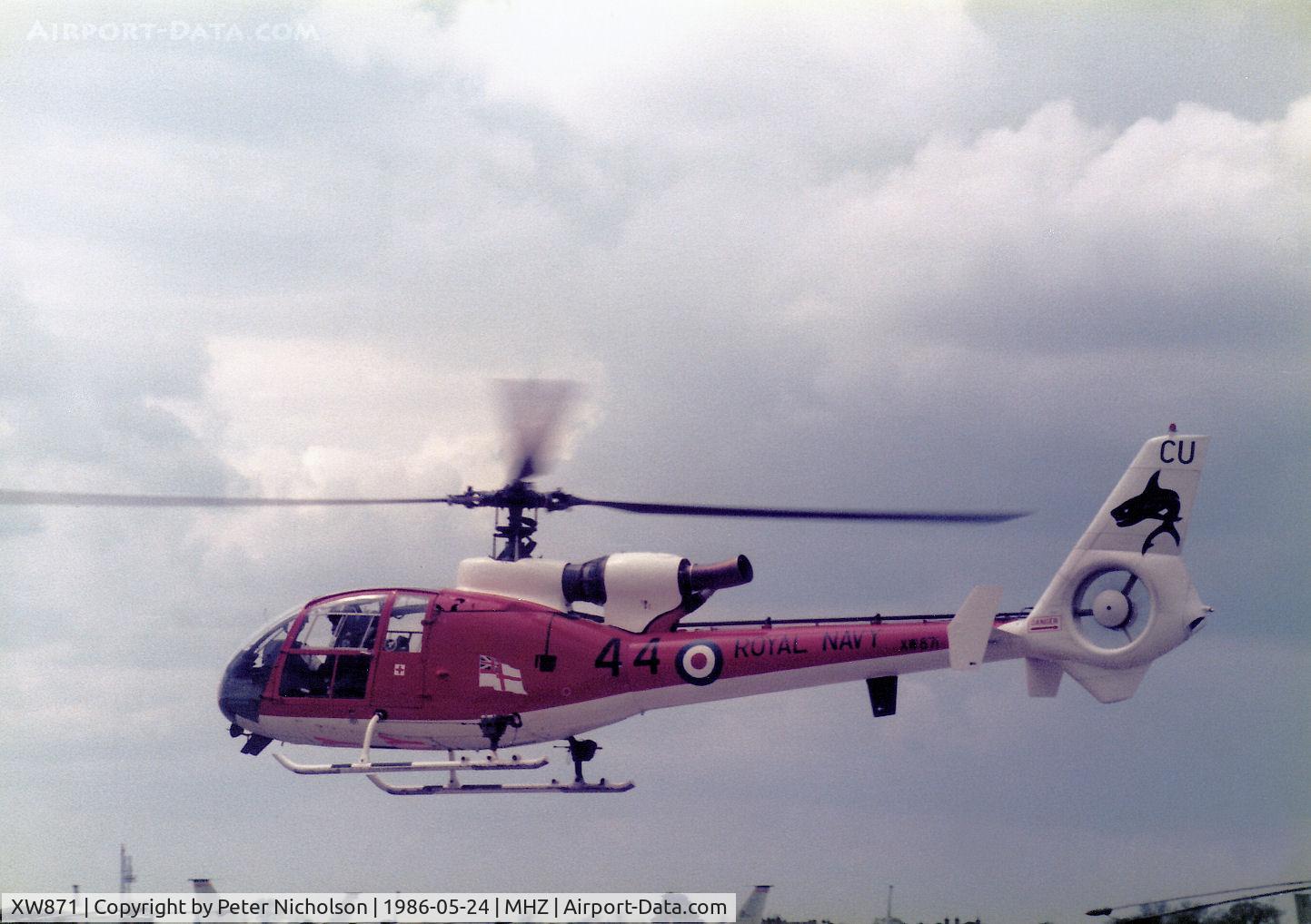 XW871, 1973 Westland SA-341C Gazelle HT2 C/N WA1148, Gazelle HT.2 of 705 Squadron's Sharks aerobatic display team at RNAS Yeovilton in action at the 1986 RAF Mildenhall Air Fete.
