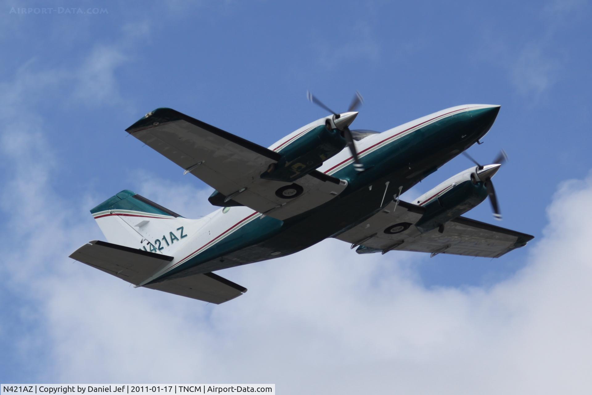 N421AZ, 1977 Cessna 421C Golden Eagle C/N 421C0401, N421AZ departing TNCM