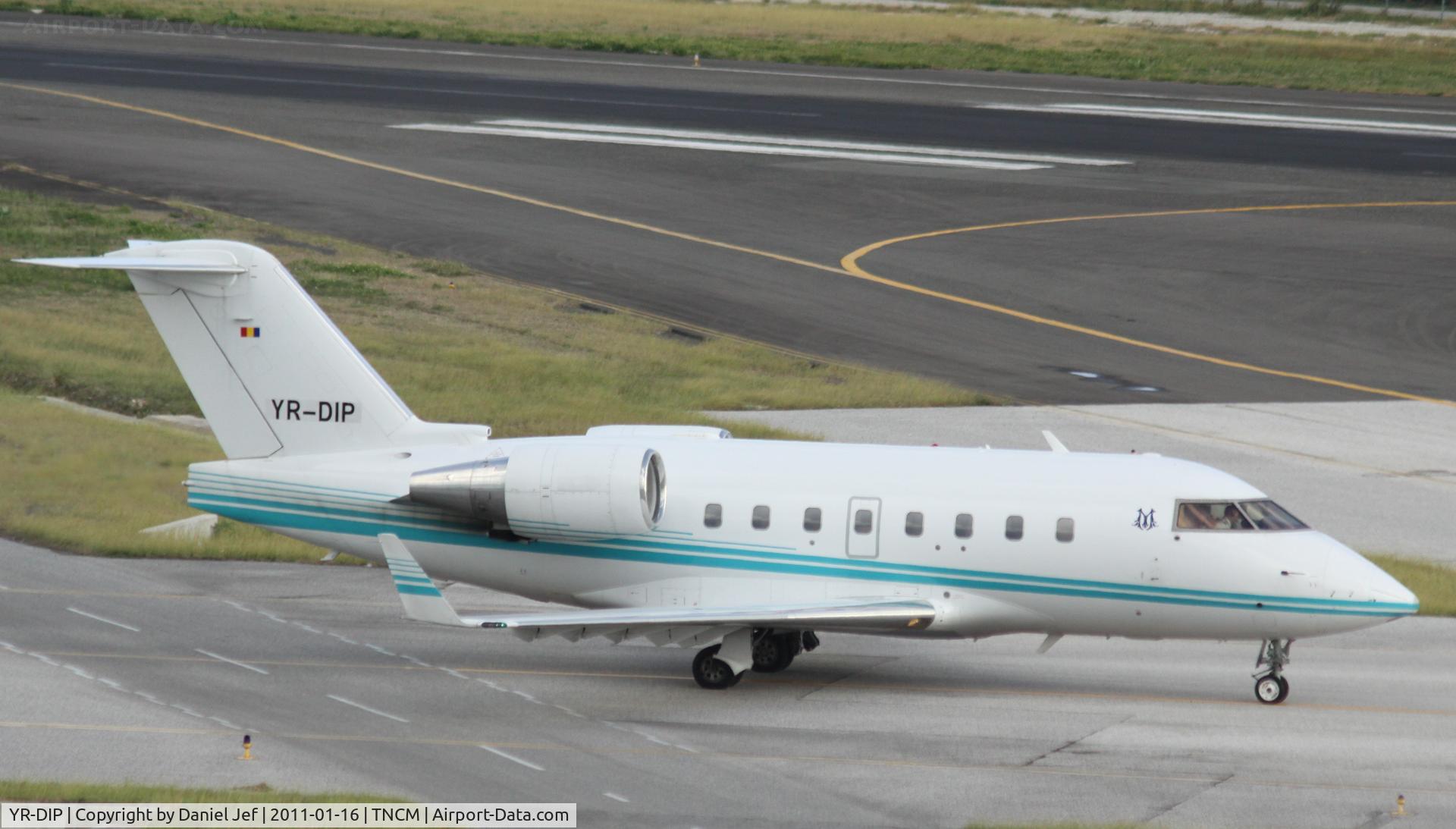 YR-DIP, 2000 Bombardier Challenger 604 (CL-600-2B16) C/N 5475, YR-DIP taxing for take off at TNCM