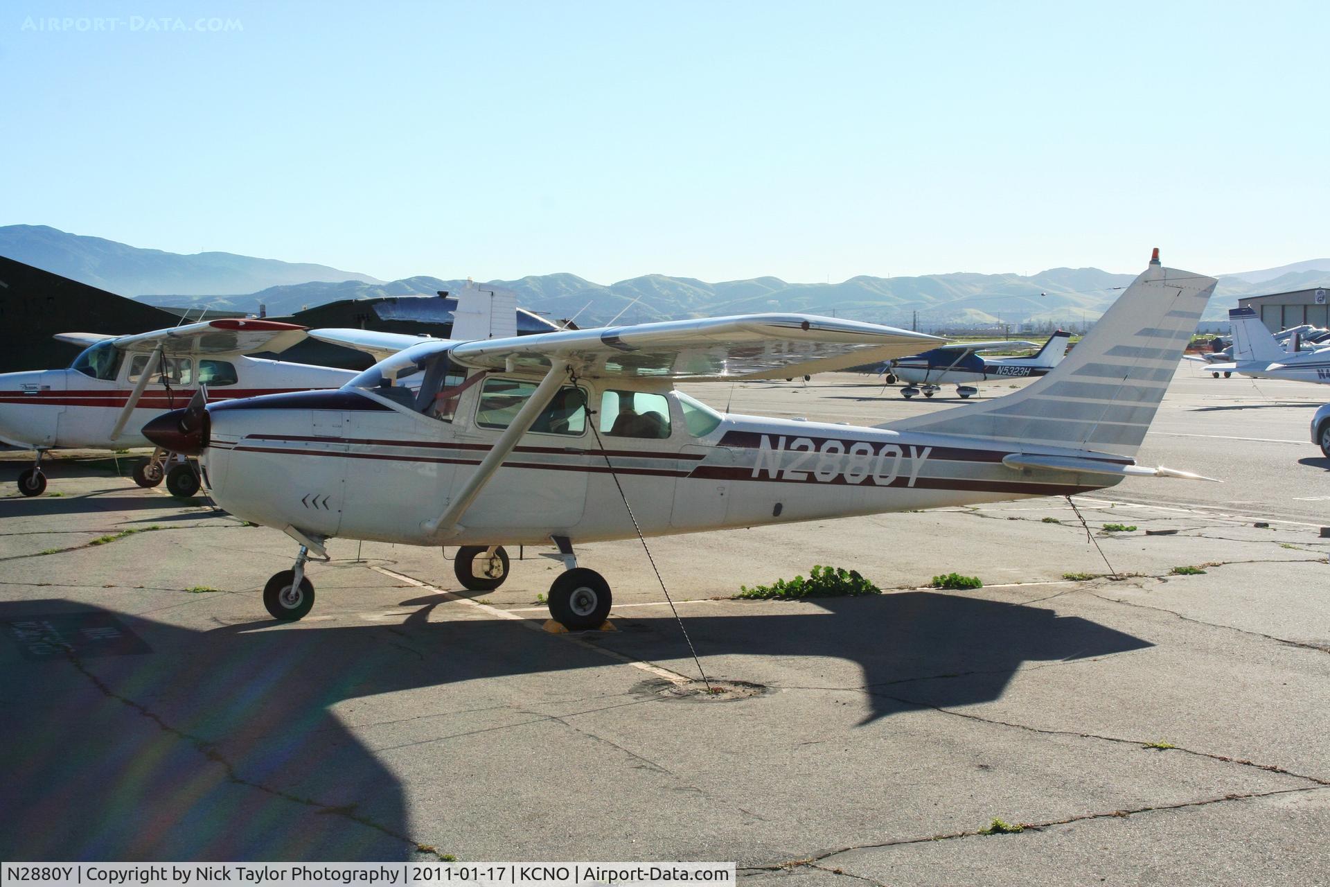 N2880Y, 1962 Cessna 182E Skylane C/N 18253880, Sitting in the Chino heat