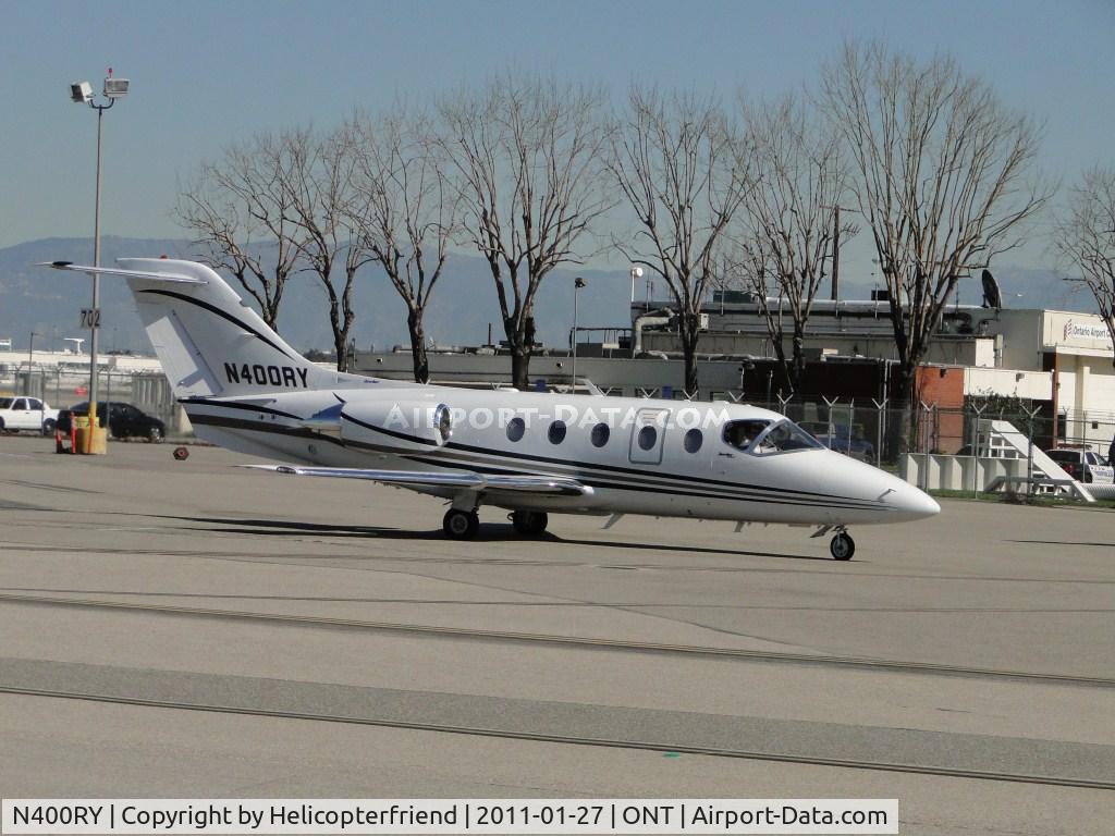 N400RY, Raytheon Aircraft Company 400A C/N RK-355, Just arriving and being parked for uloading of passengers