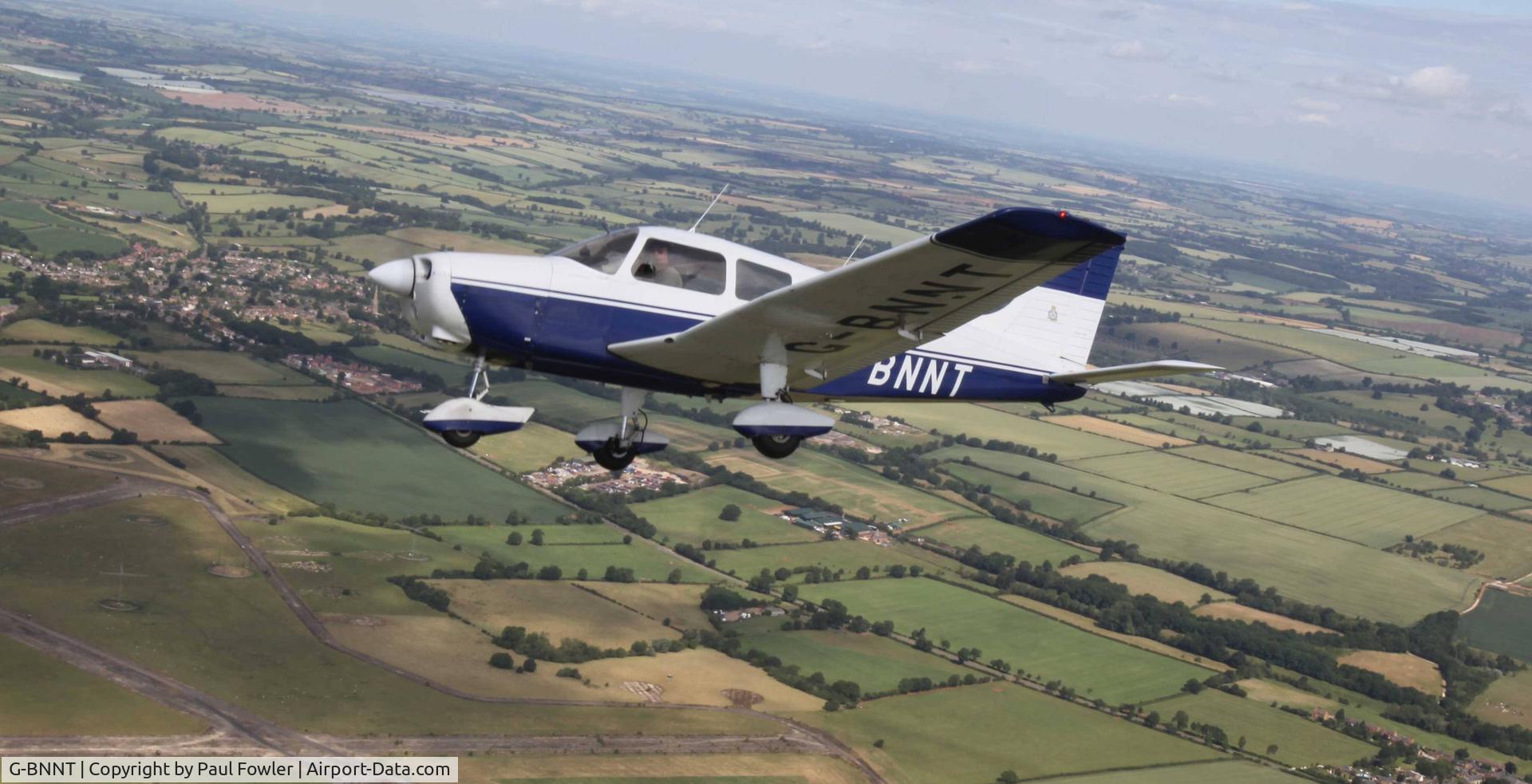 G-BNNT, 1976 Piper PA-28-151 Cherokee Warrior C/N 28-7615056, G-BNNT flying over Oxfordshire