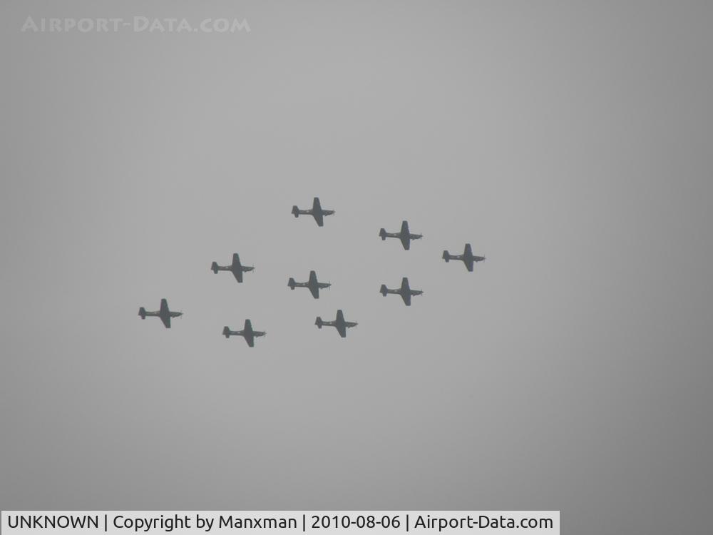 UNKNOWN, Miscellaneous Various C/N unknown, Formation of 9 Tucanos out of Linton-on-Ouse. Over Pickering, North Yorkshire
