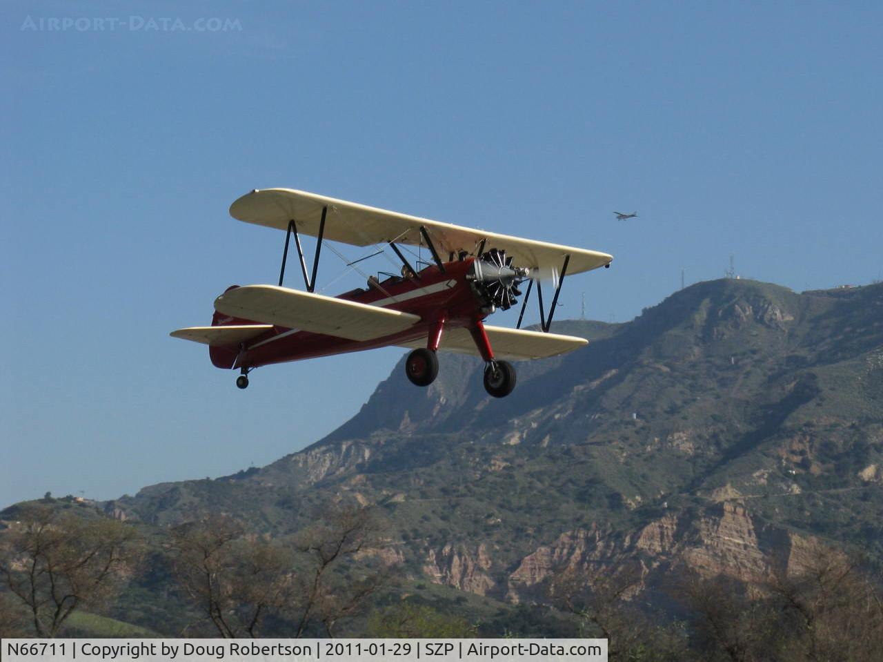 N66711, 1941 Boeing IB75A C/N 75-1675, 1941 Boeing Stearman 1B75A, Jacobs R-755B2 275 Hp upgrade, Restricted, Experimental class, takeoff climb Rwy 22
