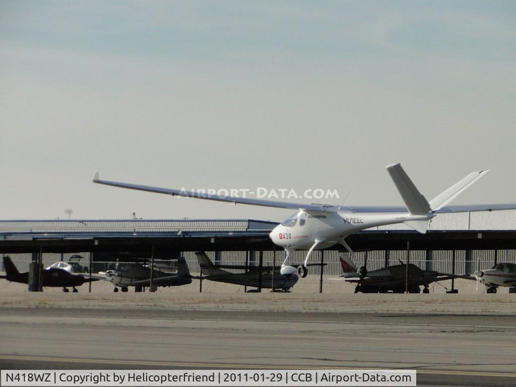 N418WZ, Yuneec E430 C/N YN-E430-0004, Noticed a vibration and landed safely on runway 24
