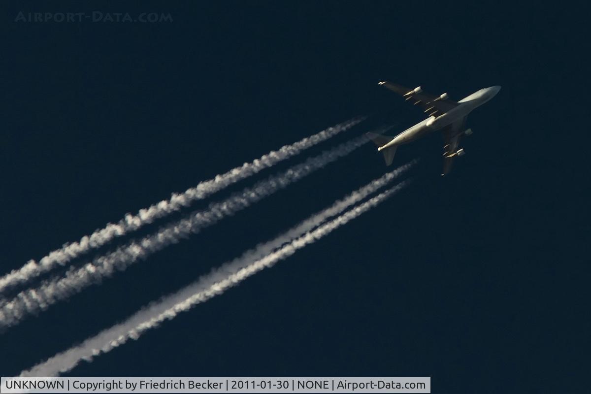 UNKNOWN, Contrails Various C/N Unknown, Cathay Pacific B747-400 cruising on its way to Asia