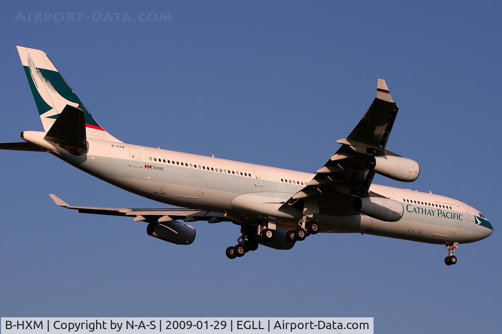 B-HXM, 1996 Airbus A340-313X C/N 123, Short final