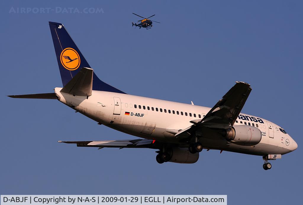 D-ABJF, 1991 Boeing 737-530 C/N 25311, Short final with Met Police EC145 waiting to cross