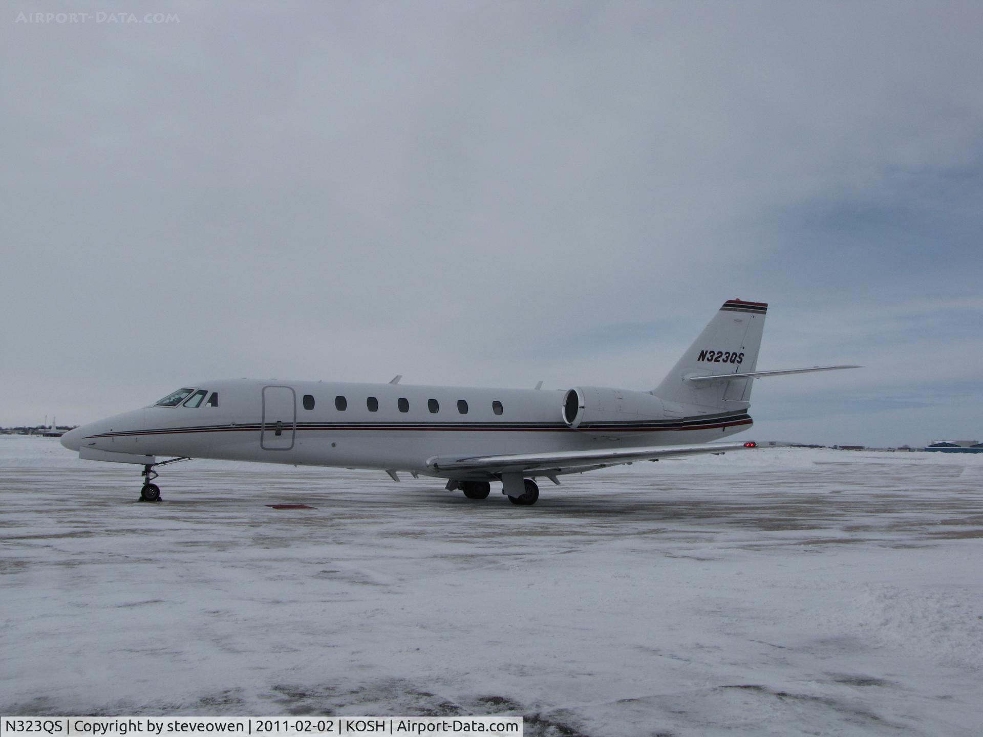 N323QS, 2007 Cessna 680 Citation Sovereign C/N 680-0134, staging through KOSH.Taken on the Orion FBO Ramp on a snowy winter day