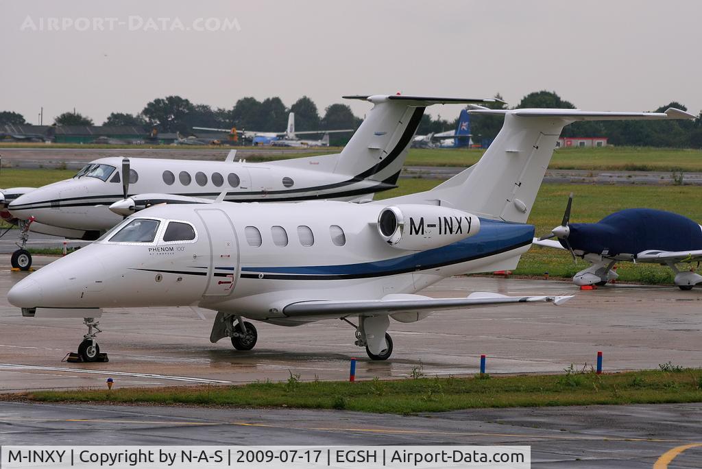 M-INXY, 2009 Embraer EMB-500 Phenom 100 C/N 50000024, Parked on the western apron