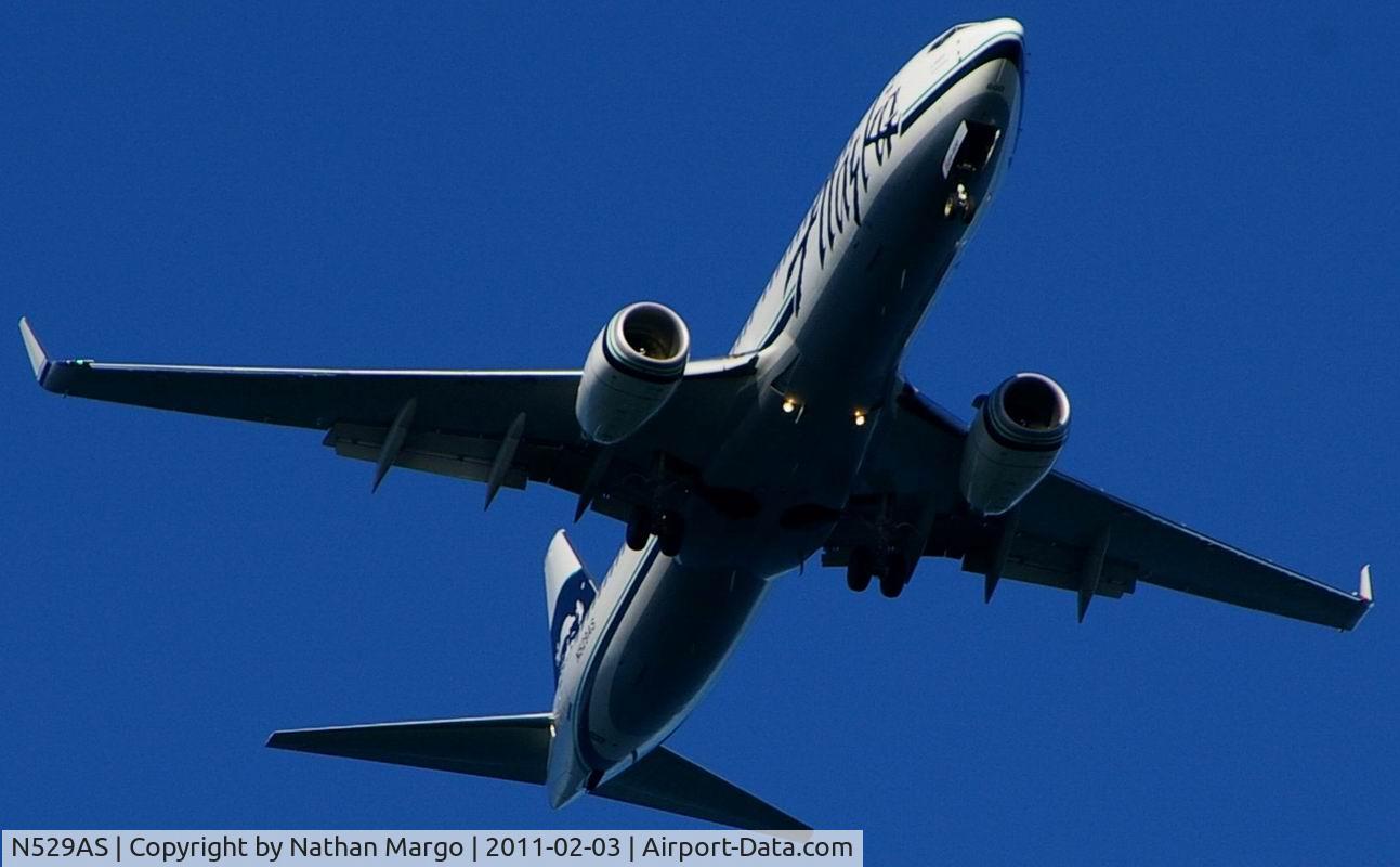 N529AS, 2010 Boeing 737-890 C/N 35198, Seen approaching Lindbergh over Ocean Beach as the runway was reversed due to prevailing Santa Ana winds.