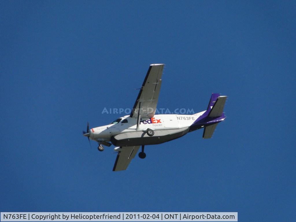N763FE, 1991 Cessna 208B Grand Caravan C/N 208B0256, High and tight turn to final for runway 26L