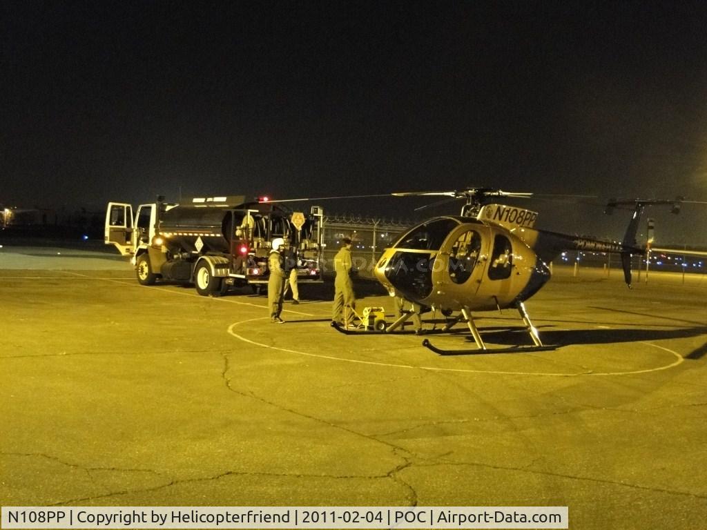 N108PP, 2008 MD Helicopters 369E C/N 0578E, Being refueled prior to takeing off for patrol services