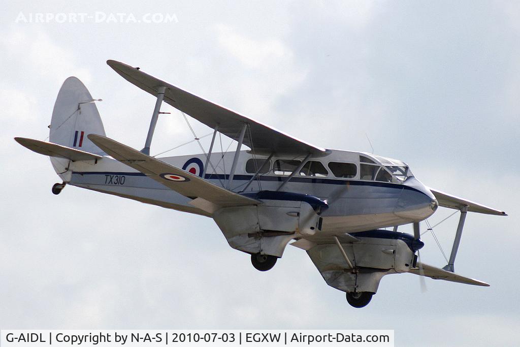 G-AIDL, 1946 De Havilland DH-89A Dominie/Dragon Rapide 6 C/N 6968, Short final, Marked as TX310