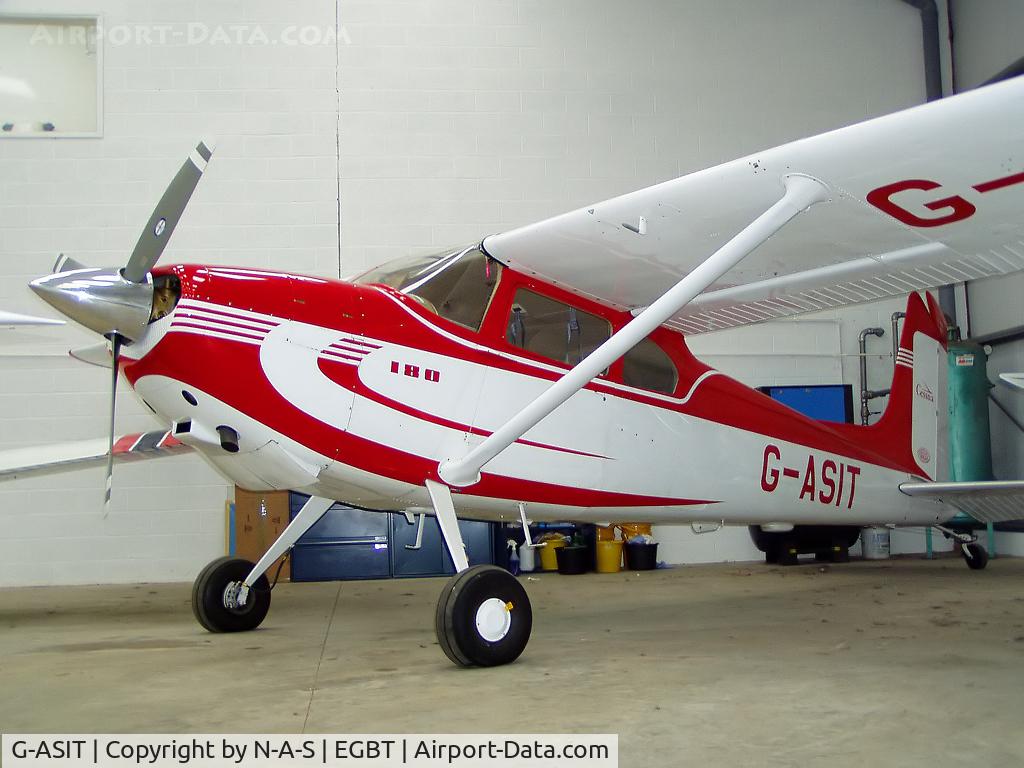 G-ASIT, 1956 Cessna 180 C/N 32567, In the back of the Cirrus hangar