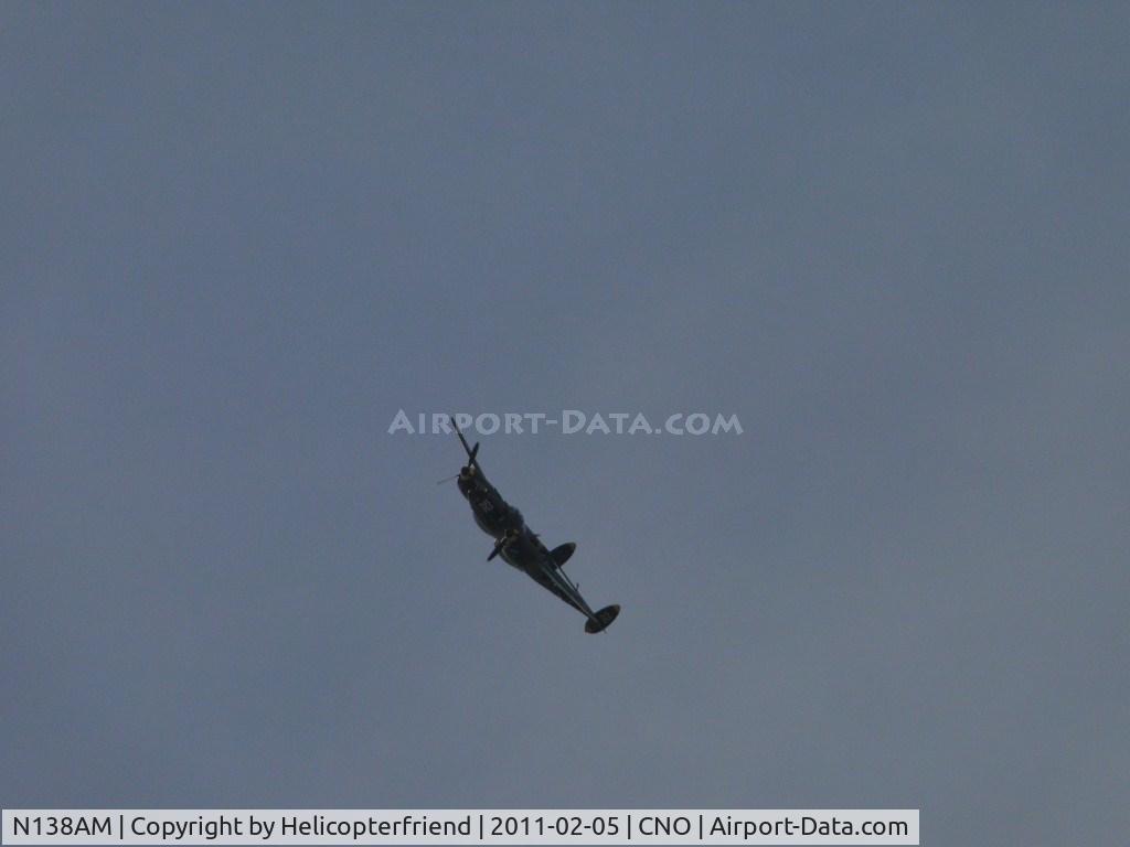 N138AM, 1943 Lockheed P-38J Lightning C/N 44-23314, Making a left turn to pass over the airport