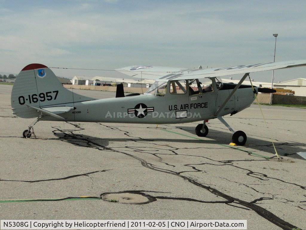 N5308G, 1951 Cessna 305A C/N 22829, Parked in the area north of runway 26R and west of the Tower