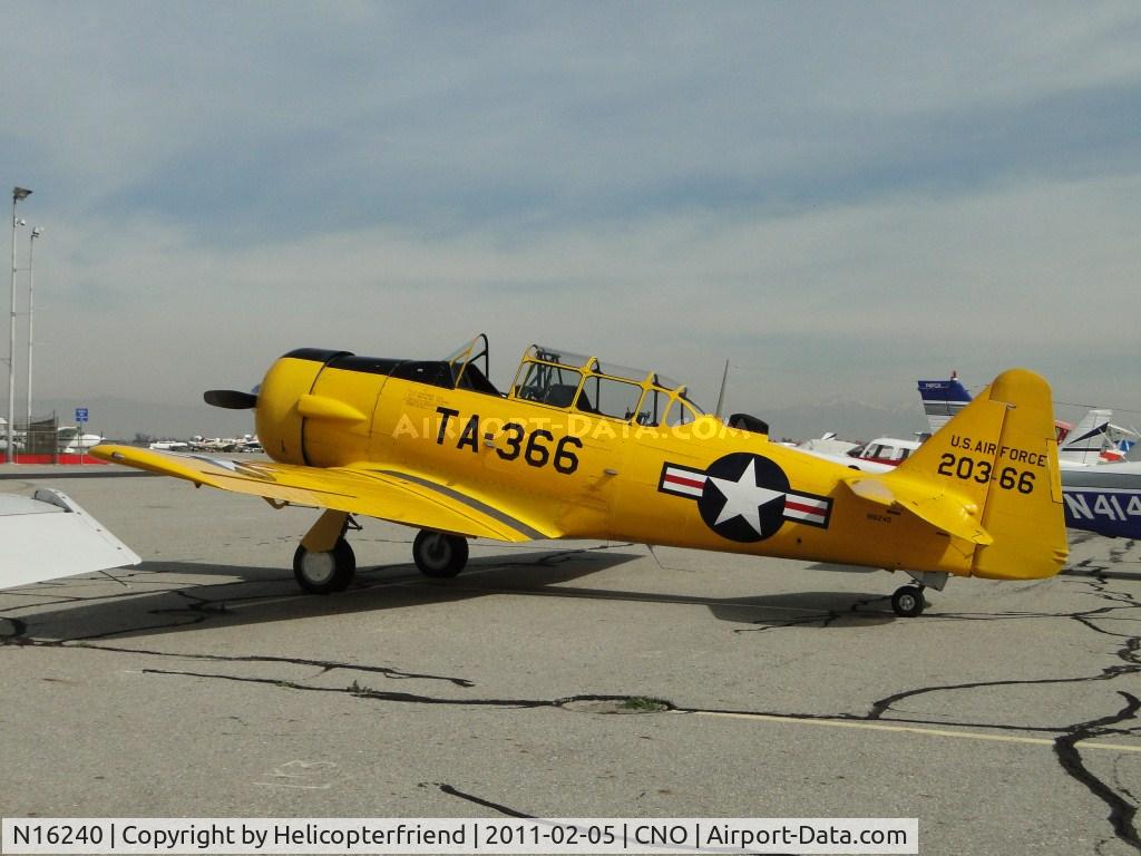 N16240, 1952 Canadian Car & Foundry (North Ameican) Harvard Mk IV C/N 20366, Parked in the area north of runway 26R and west of the Tower