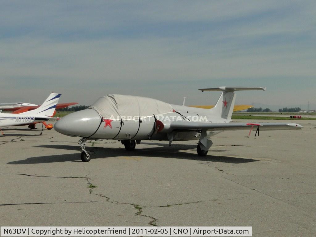 N63DV, 1965 Aero L-29 Delfin C/N 591416, Parked in the area north of runway 26R and west of the Tower, covered up for protection against the sun