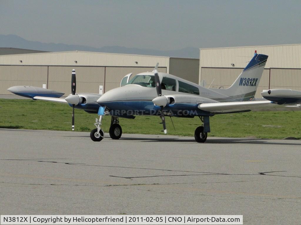 N3812X, 1966 Cessna 310K C/N 310K0212, Parked in the area north of runway 26R and west of the Tower