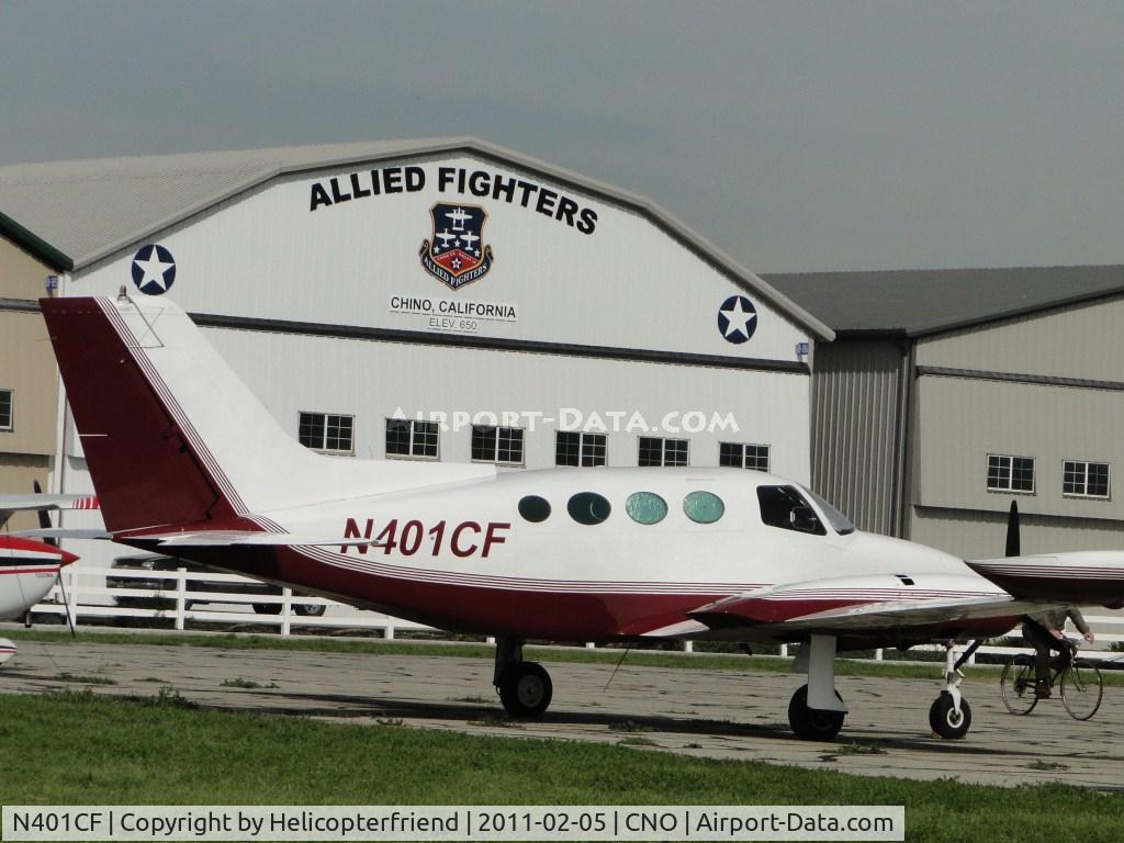 N401CF, 1967 Cessna 401 C/N 401-0115, Parked in the area north of runway 26R and west of the Tower