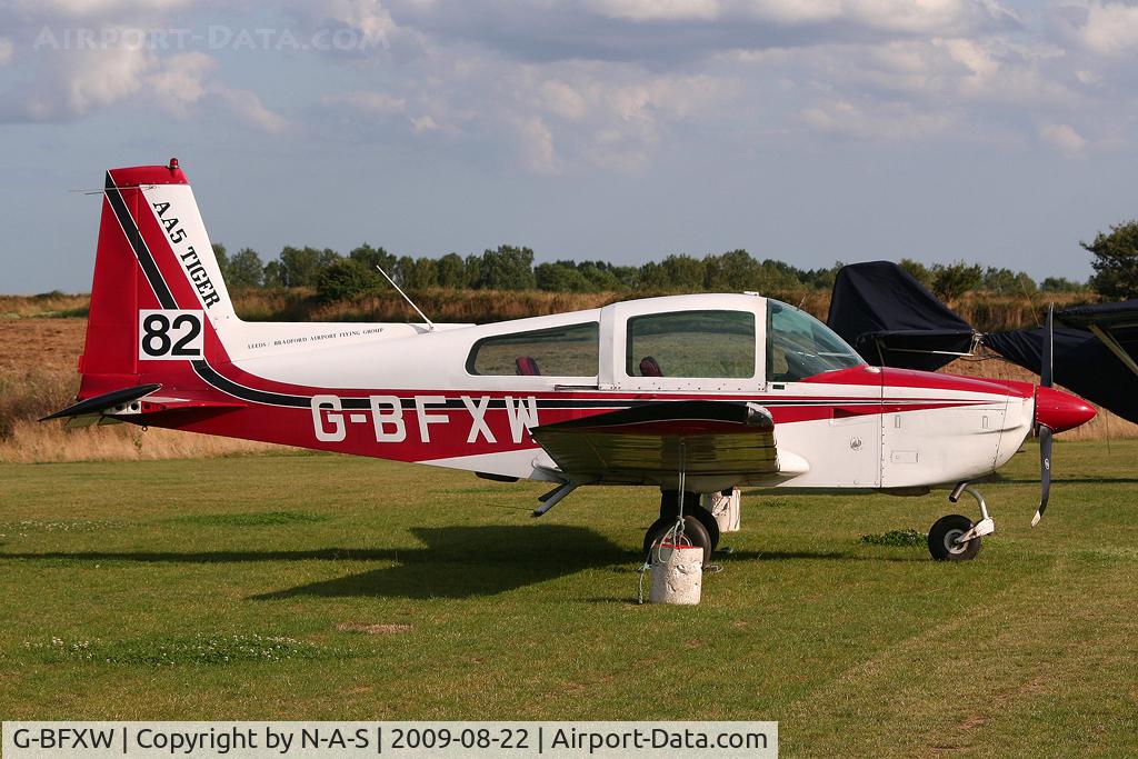 G-BFXW, 1978 Grumman American AA-5B Tiger C/N AA5B-0940, Slightly damaged after hard landing. Taken at Northrepps, UK