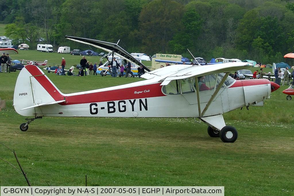 G-BGYN, 1977 Piper PA-18-150 Super Cub C/N 18-7709137, Departing Micro trade fair