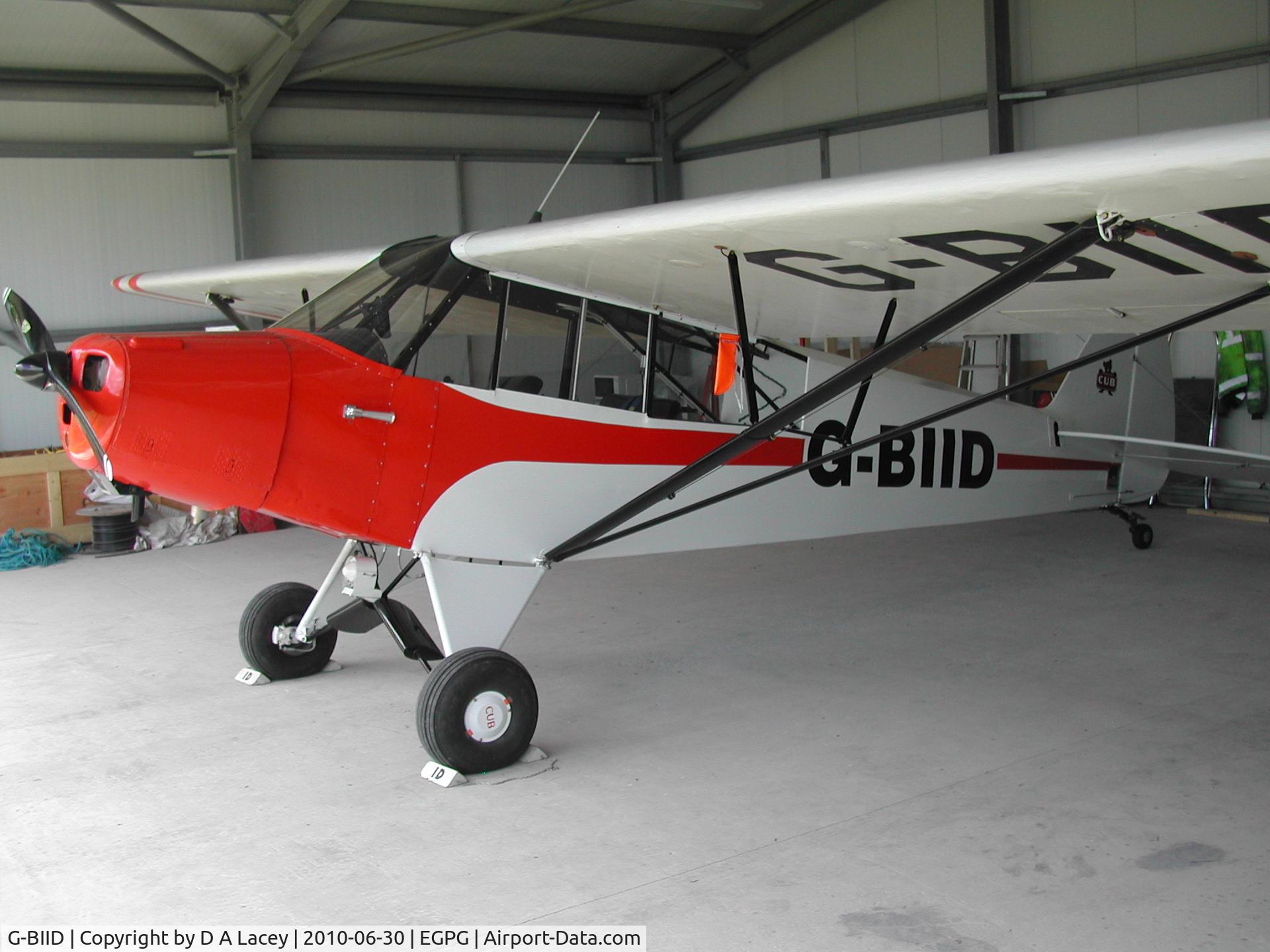 G-BIID, 1951 Piper L-18C Super Cub (PA-18-95) C/N 18-1606, G-BIID snug in her hangar at Cumbernauld.