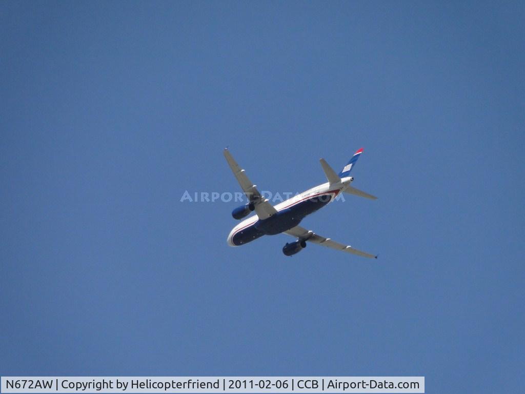 N672AW, 2004 Airbus A320-232 C/N 2193, Westerly downwind for runway 8 at Ontario and passing north of Cable