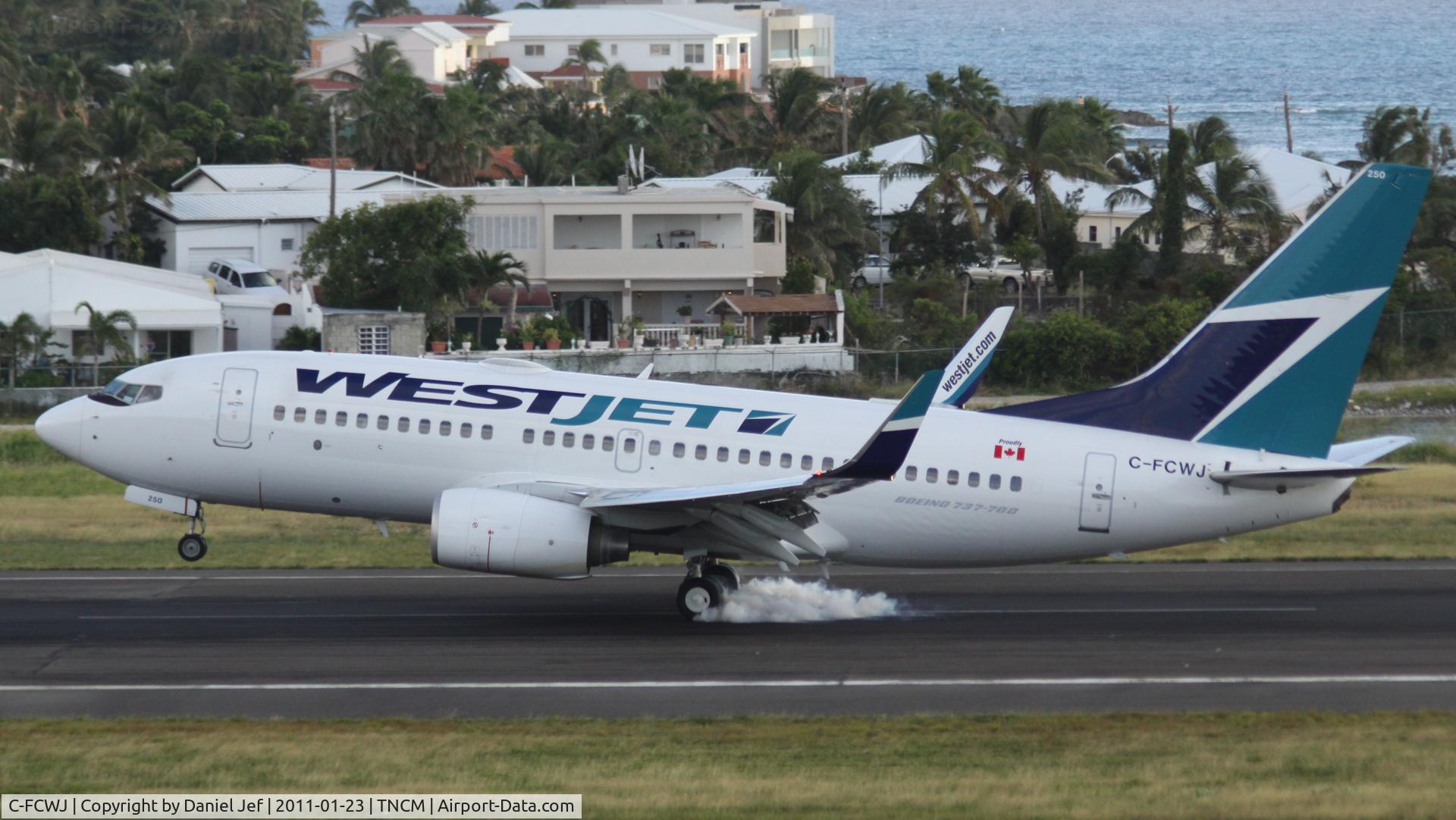 C-FCWJ, 2008 Boeing 737-7CT C/N 35086, West jet landing at TNCM