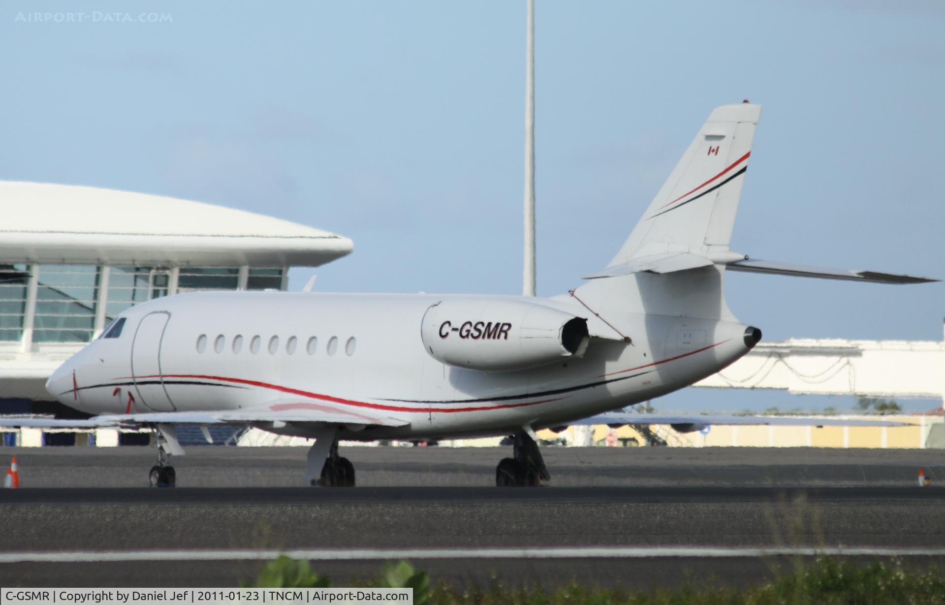 C-GSMR, 1999 Dassault Falcon 2000 C/N 88, C-GSMR park on the main ramp at TNCM