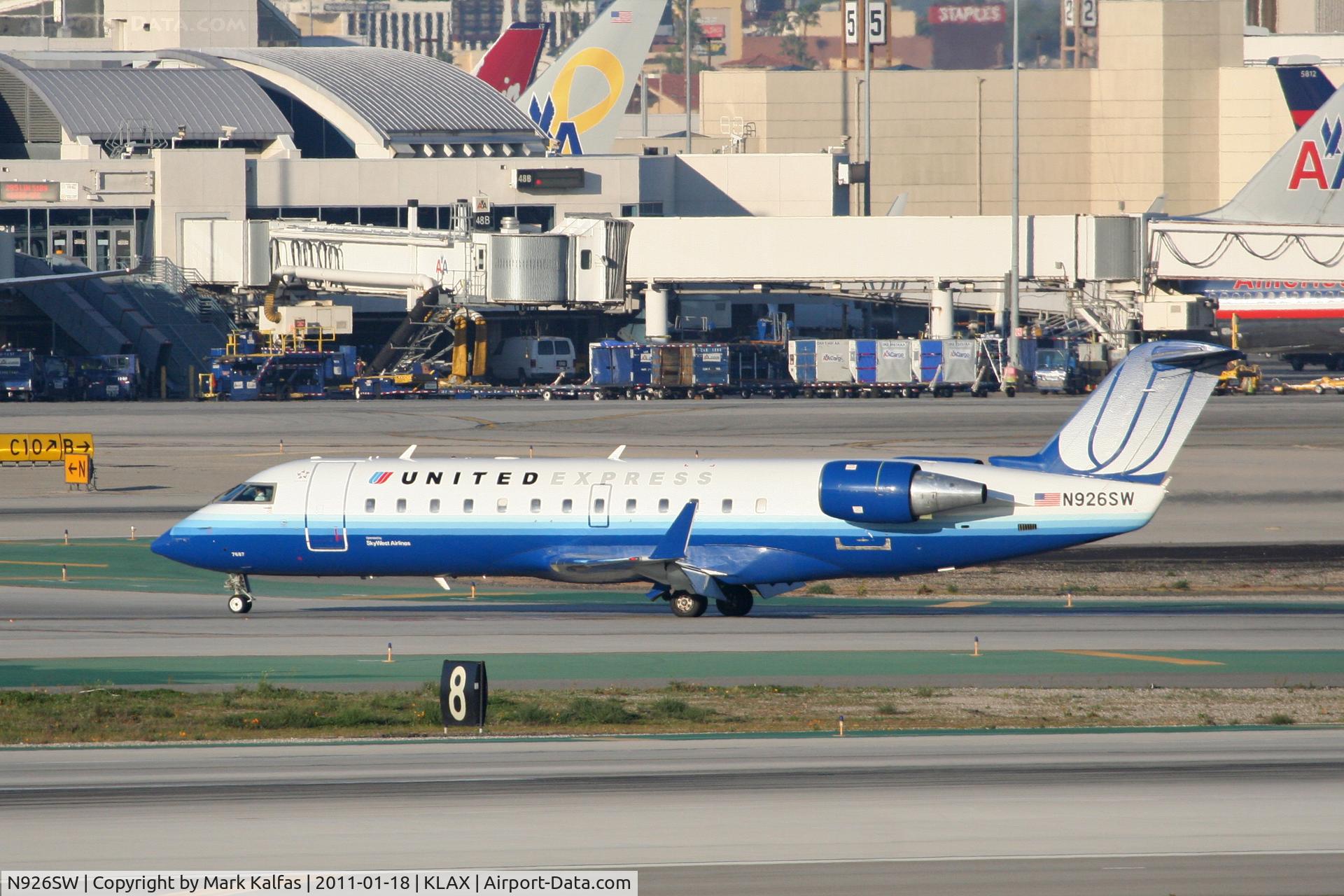 N926SW, 2002 Bombardier CRJ-200LR (CL-600-2B19) C/N 7687, SkyWest/United Express Bombardier CL-600-2B19, SKW6522 turning off of 25L at H8 KLAX after arriving from KPHX.