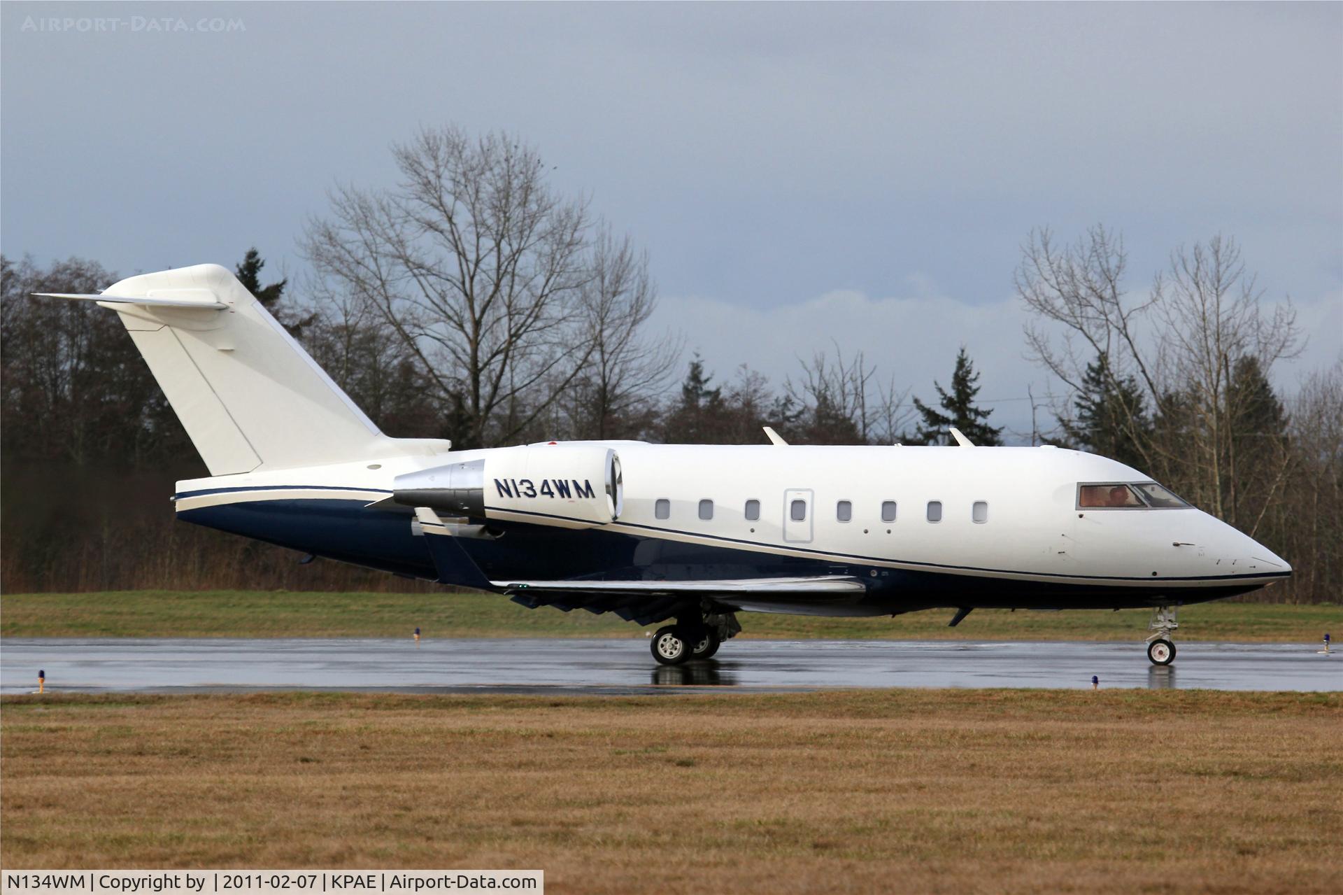 N134WM, 1997 Canadair Challenger 604 (CL-600-2B16) C/N 5340, KPAE N134WM doing some landing and taxi back pattern work this morning seen here heading back to 16R for another trip around the pattern.