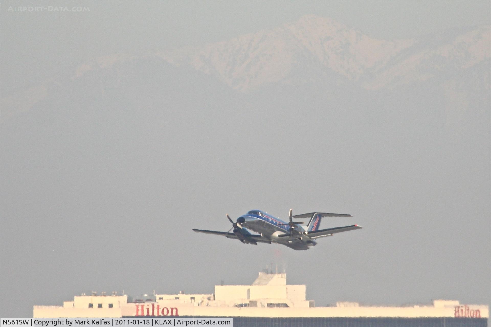 N561SW, 1998 Embraer EMB-120 Brasilia C/N 120335, SkyWest/United Express Embraer EMB-120, SKW6475 departing 25R KLAX enroute to KNYL/Yuma.