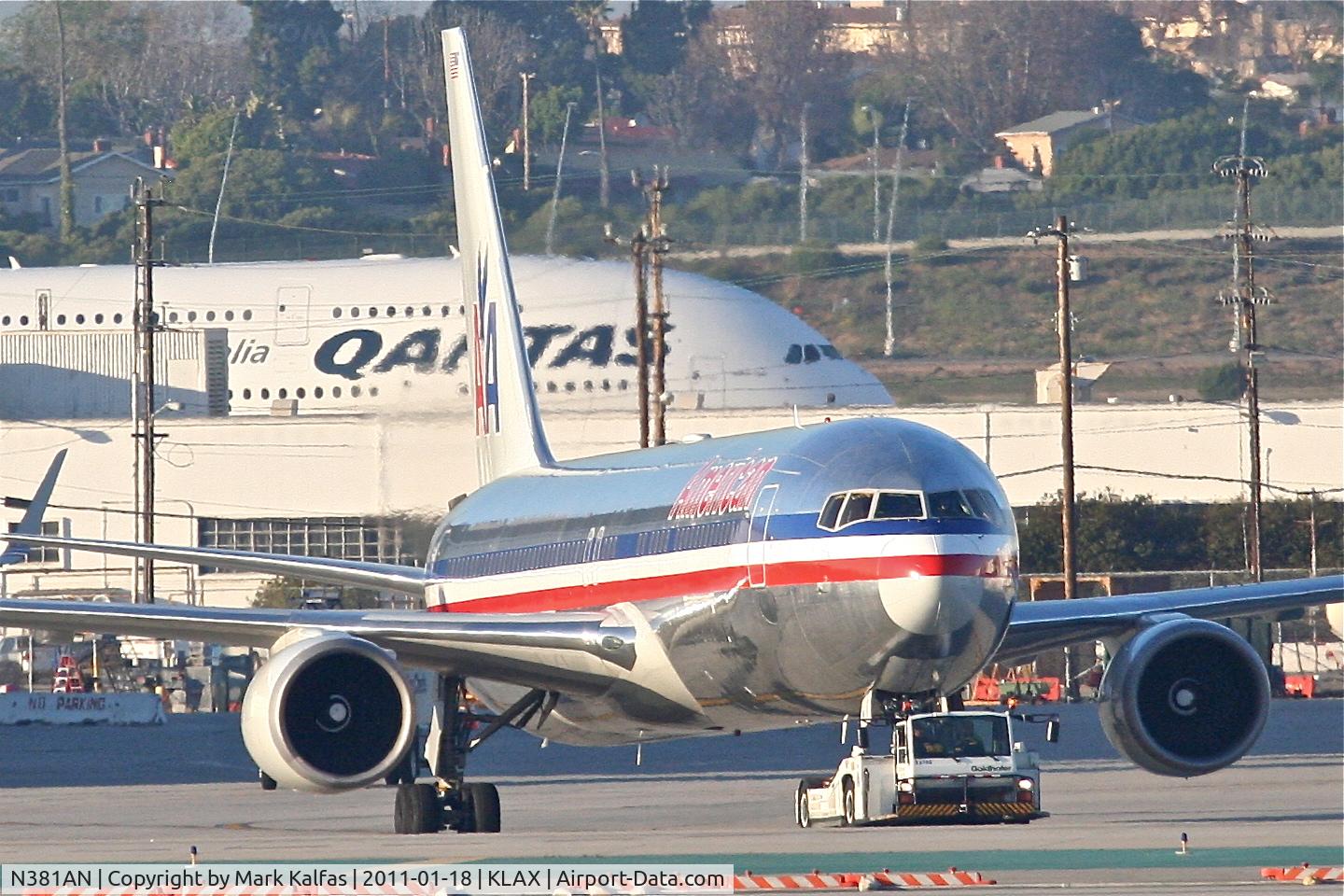N381AN, 1993 Boeing 767-323 C/N 25450, American Airlines Boeing 767-323, getting a tow to the AA maintenance hangar at KLAX.