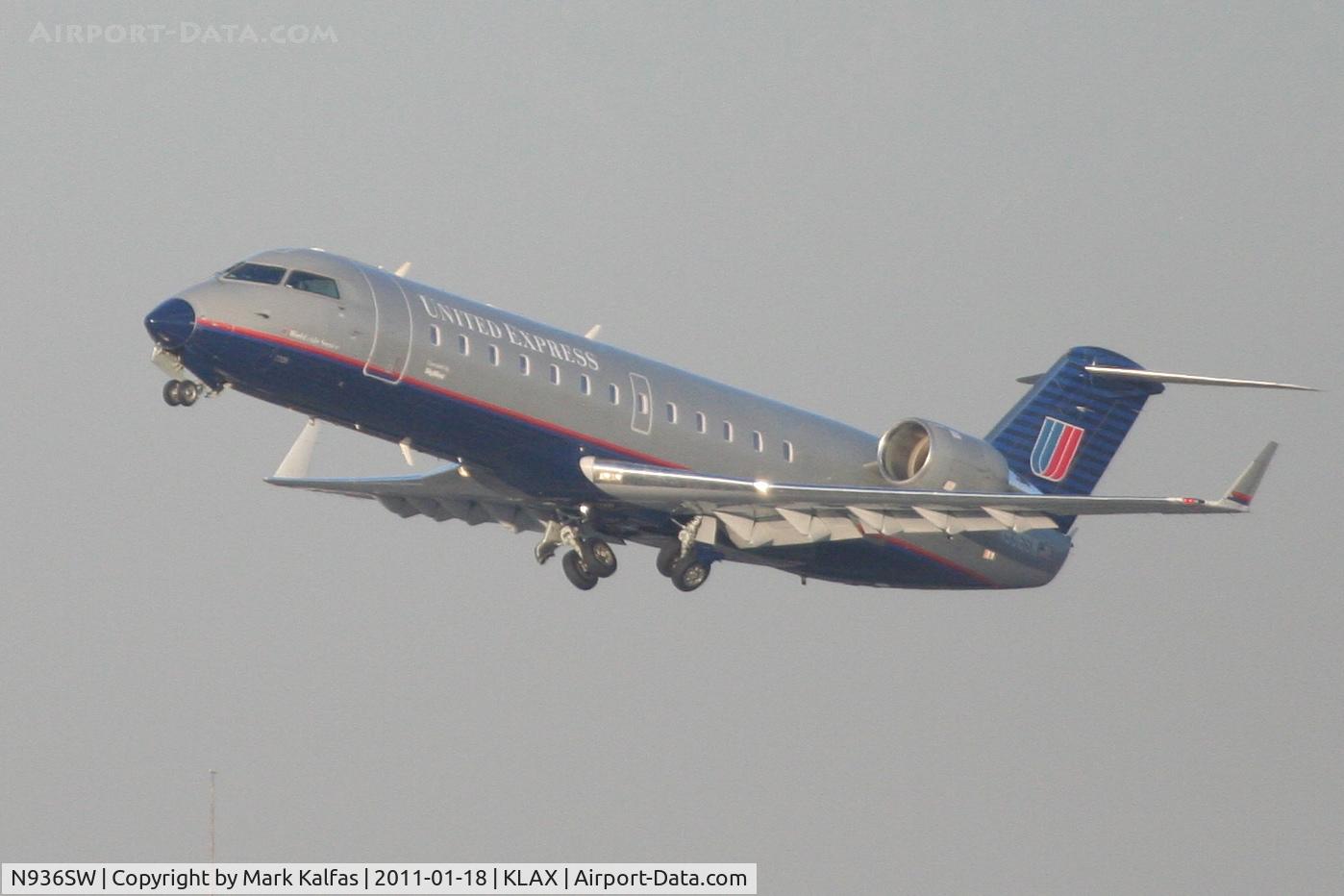 N936SW, 2002 Bombardier CRJ-200LR (CL-600-2B19) C/N 7726, SkyWest/United Express Bombardier CL-600-2B19, SKW6490 departing RWY 25R KLAX enroute to KRNO.