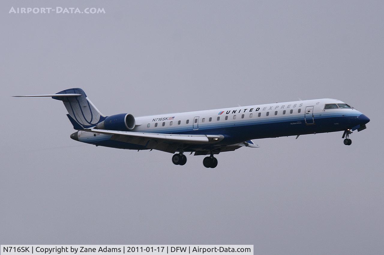 N716SK, 2004 Bombardier CRJ-701ER (CL-600-2C10) Regional Jet C/N 10180, United Express at DFW Airport