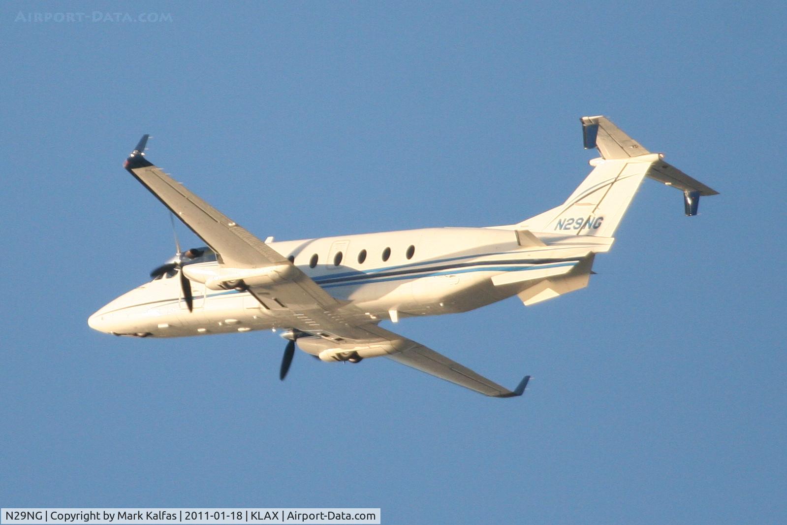 N29NG, 1997 Beech 1900D C/N UE-303, Northrop Grumman Raytheon Aircraft Company 1900D, on a modified 25L crosswind departure KLAX.