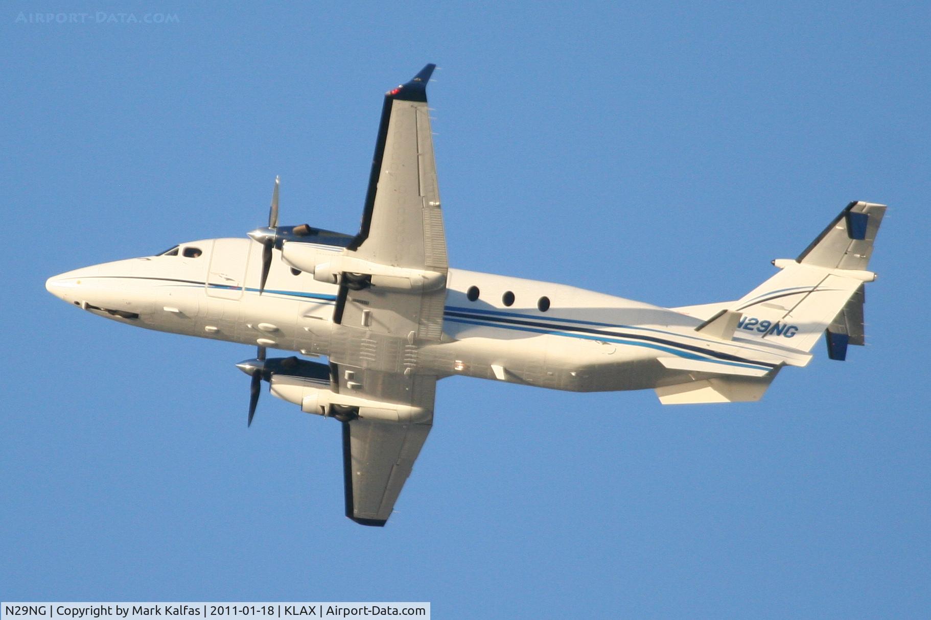 N29NG, 1997 Beech 1900D C/N UE-303, Northrop Grumman Raytheon Aircraft Company 1900D, on a modified 25L crosswind departure KLAX.
