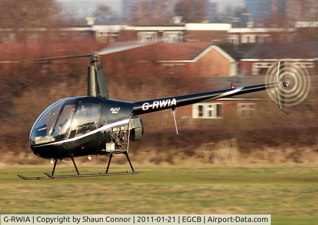 G-RWIA, 1988 Robinson R22 Beta C/N 0753, Robinson R44. Barton resident.