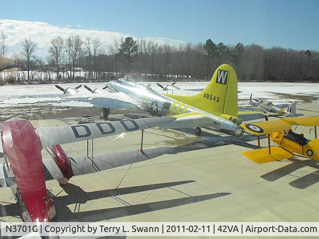 N3701G, 1944 Boeing B-17G Flying Fortress C/N 44-8543A, Parked in the sun with the snow melting at VA Beach Airport.