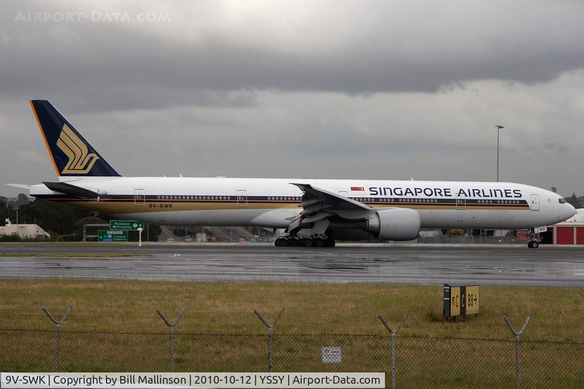 9V-SWK, 2007 Boeing 777-312/ER C/N 34576, rain, rain, go away!